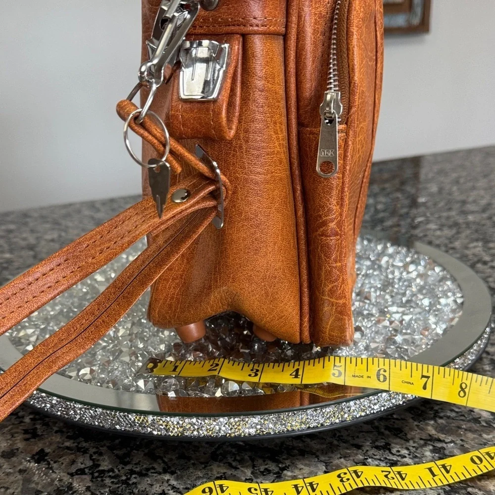 World Traveler Vintage tan Leather locking Bag